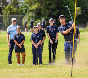 Students playing golf