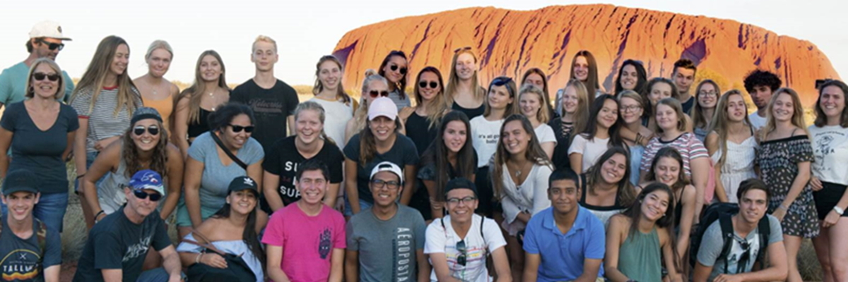 A group of students in front of Uluru